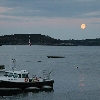 Fishing boat with moon